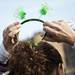 A participant adjusts her Irish costume at the Shamrocks and Shenanigans on Sunday, March 10. Daniel Brenner I AnnArbor.com